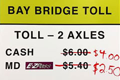 Toll sign with prices lowered